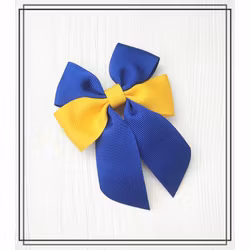 "Stand with Ukraine" - rosett med broschnål, hårklämma eller hårsnodd