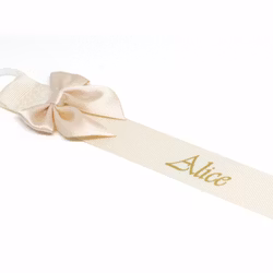 Gräddvit napphållare med champagnefärgad rosett - silver