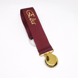 Vinröd napphållare - guld