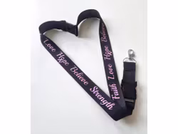 Nyckelband "Faith Love Hope Believe Strength" rosa bandet - svart