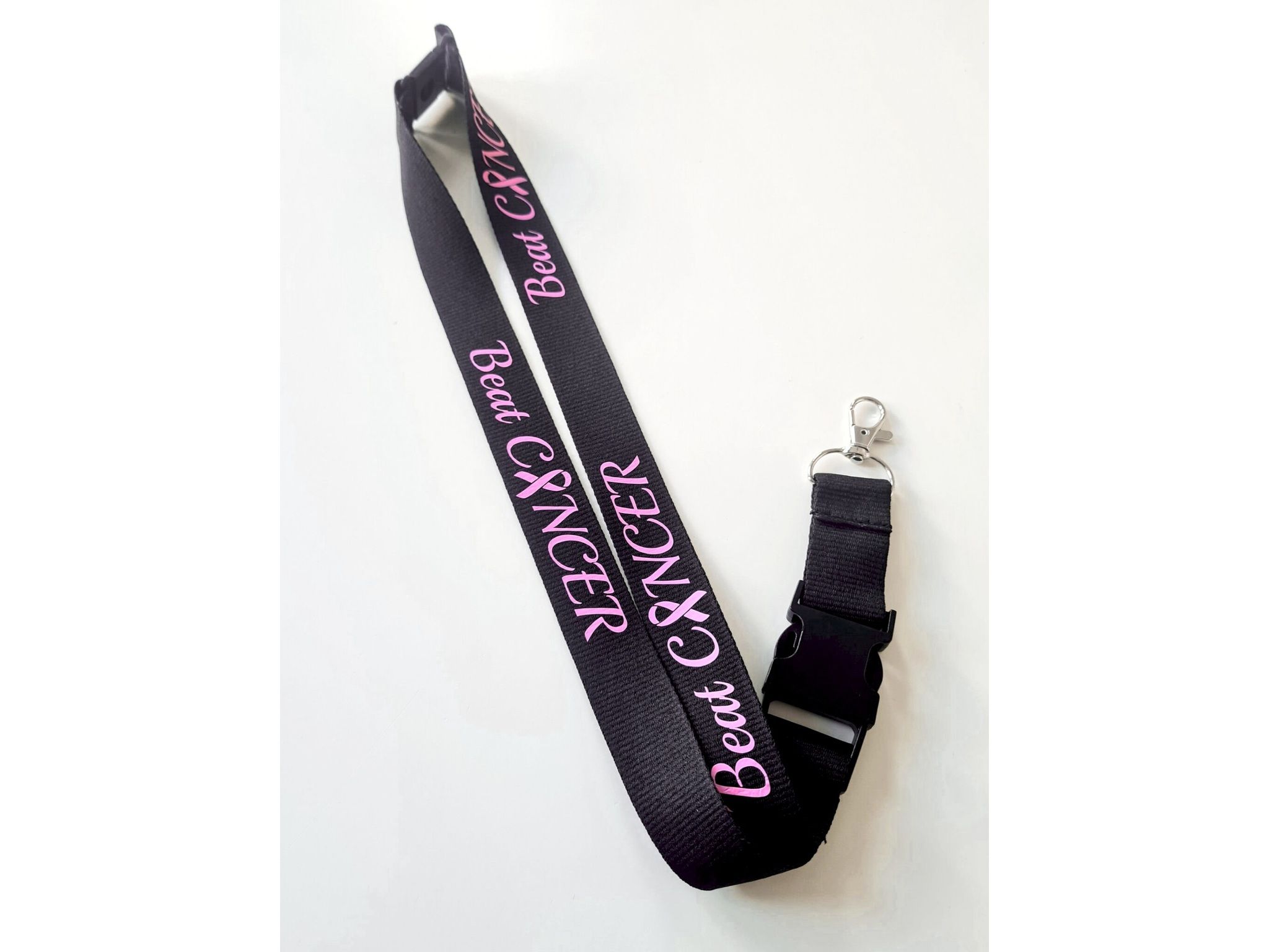 Nyckelband "Beat CANCER" rosa bandet - svart