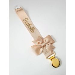 Beige napphållare med Gerda-rosett