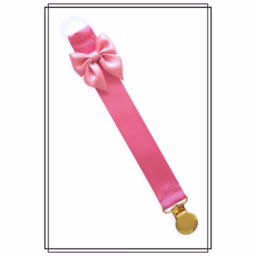 Cerise napphållare med rosa rosett - guld