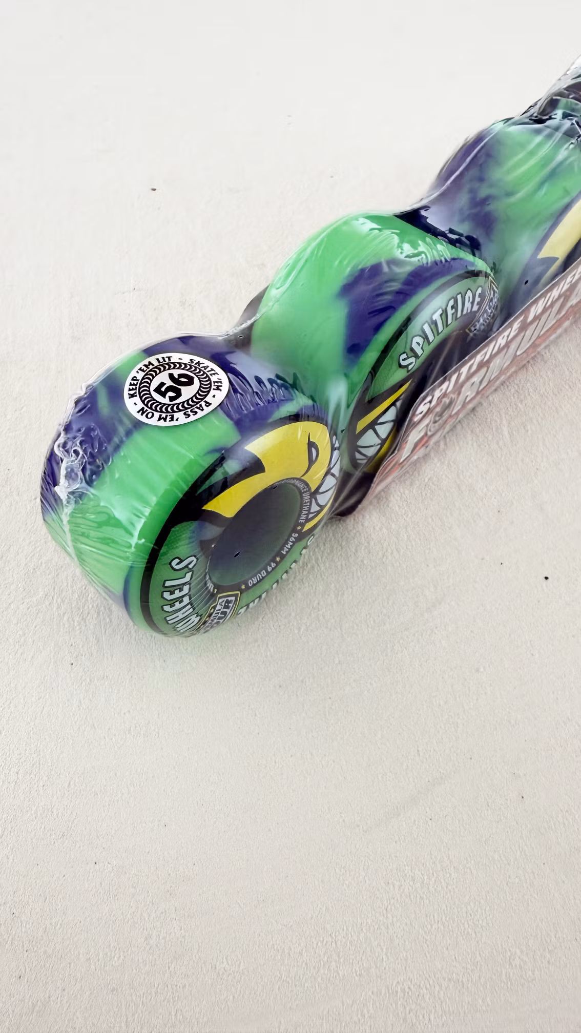 Spitfire Wheels Formula Four Radial Full Skateboard Wheels 99a 56mm Green Purple Swirl angle – Nordic Skateboard Supply