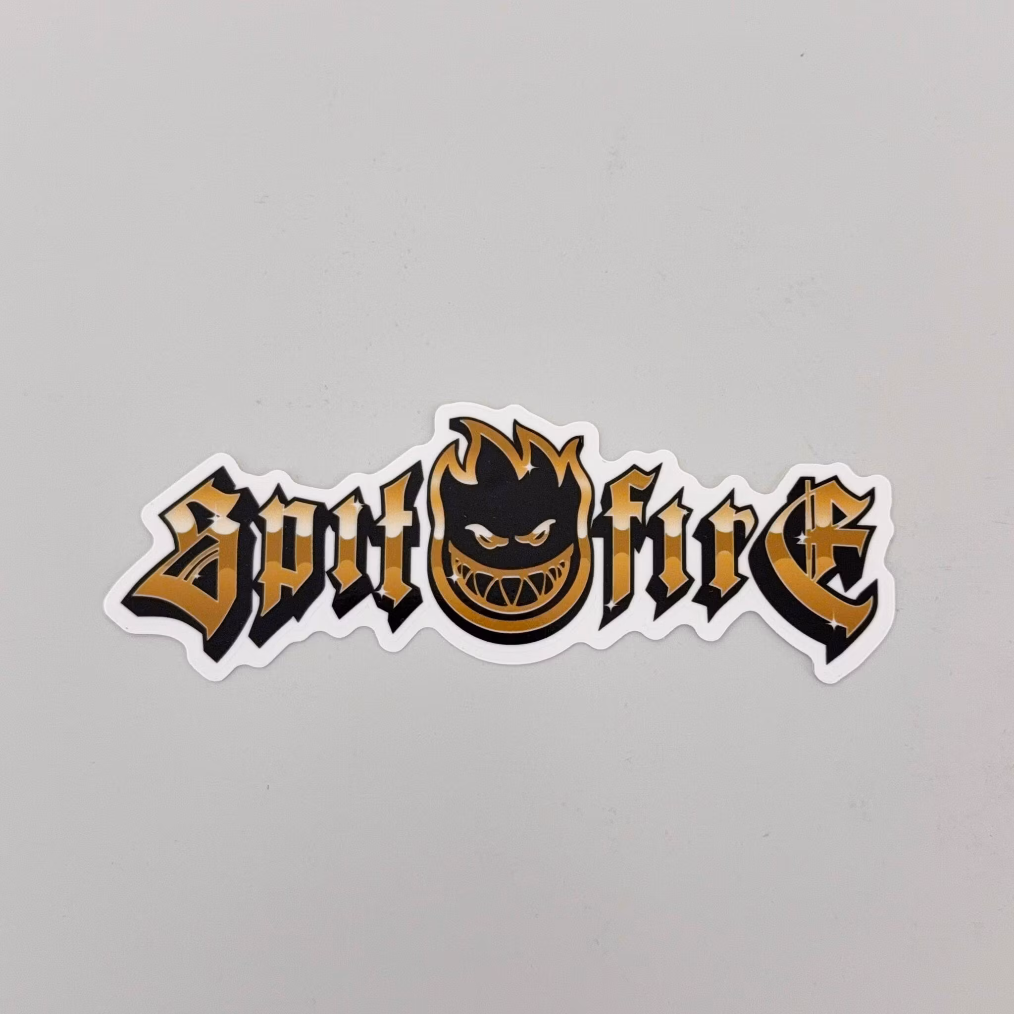 Spitfire Gold Chrome Black Sticker medium – Nordic Skateboard Supply