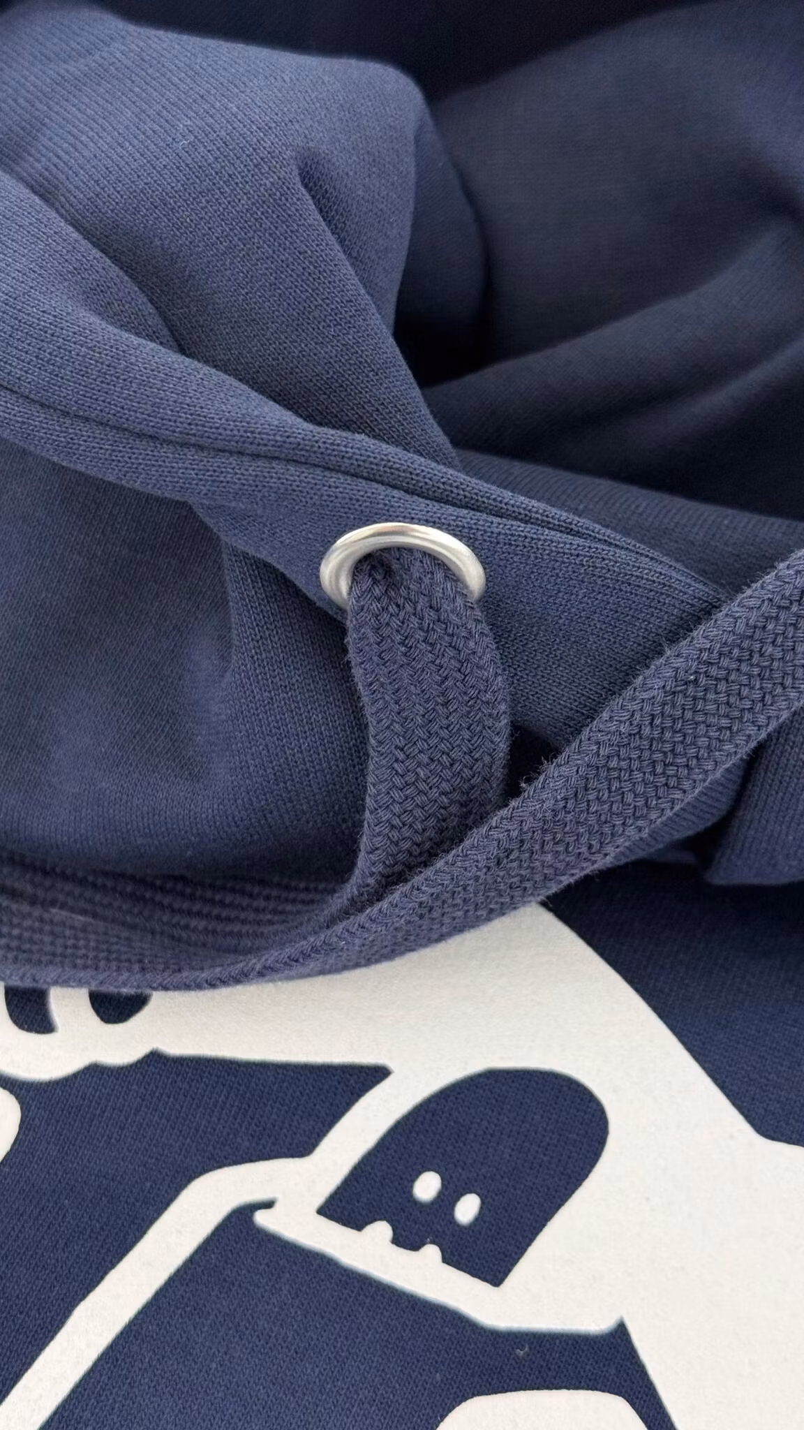 Hoodie Nordic Skateboard Supply Logo light grey logo print closeup hood – Nordic Skateboard Supply