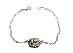 Silverarmband med rustik bricka