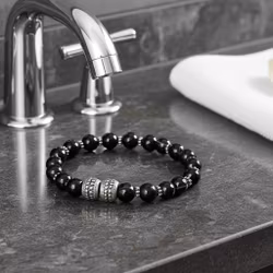 Killarmband svarta pärlor
