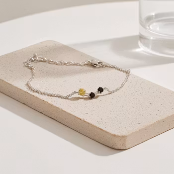 Armband svart och gult silver