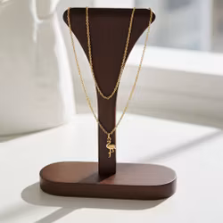 Halsband med fågelhänge