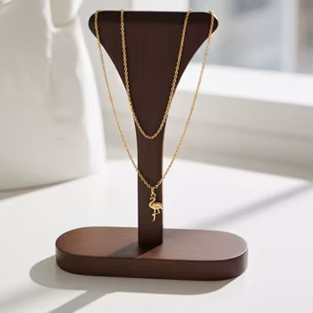 Halsband med fågelhänge