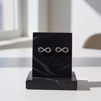 Silverörhängen Evighetssymboler