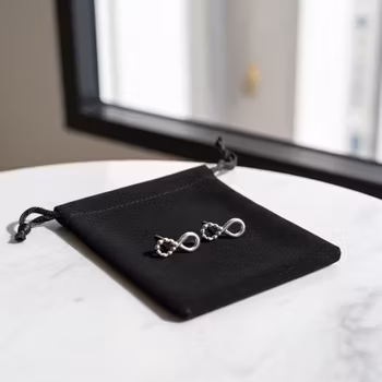 Silverörhängen Evighetssymboler