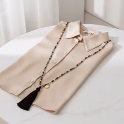 Knutet pärlhalsband med tassel