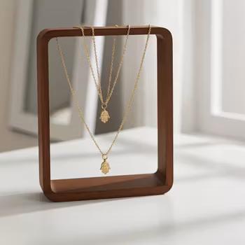 Halsband med kedja och Hamsa hand