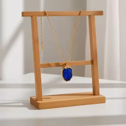 Guldpläterat halsband med blå sten