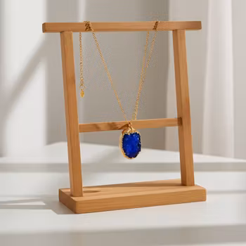 Guldpläterat halsband med blå sten