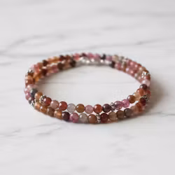 Herrarmband bruna stenar