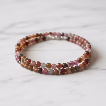 Herrarmband bruna stenar