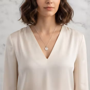 Silverpläterat halsband med rund bricka
