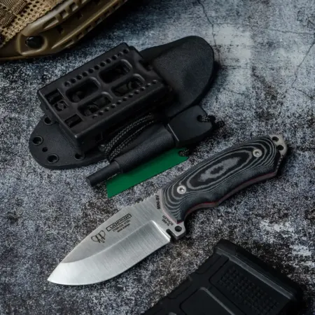 Cudeman Mini Boina Verde jaktkniv 9 cm – Böhler N695, svart micarta & Kydexslida