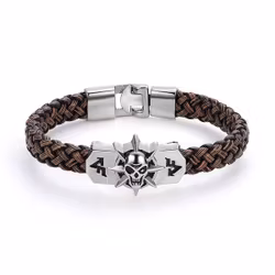 Armband med dödskalle i metall och flätad rem
