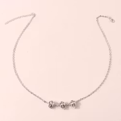 Halsband med tre dödskallar i silver