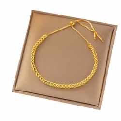 Stilrent guldfärgat armband med justerbar fiskbensdesign