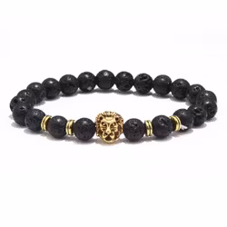 Svart armband med vulkansten & guldlejon
