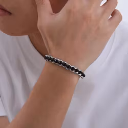 Armband med flätad textil och stålkedja