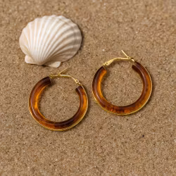 Guldfärgade creoler med bärnstensmönstrad glans