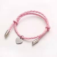 Mjukt rosa textilarmband med rostfritt stål