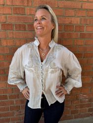 Beige blus gulddetaljer
