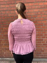Rosa blus med smock