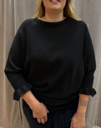Svart tröja med volangärm