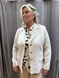Ljusbeige kavaj med guldknappar