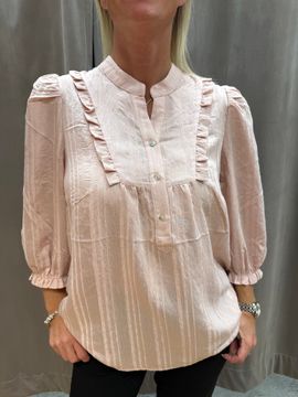 Rosa blus med krås