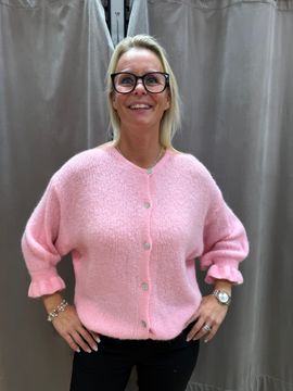 Ljusrosa stickad kofta med volangärm
