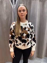 Jumper med ko mönster