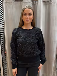 Svart sweatshirt med 3D-blommor