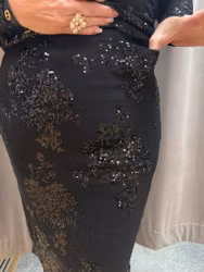 Svart paljettkjol med spetsdetaljer
