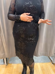 Svart paljettkjol med spetsdetaljer