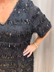 Svart klänning med fransar och paljetter