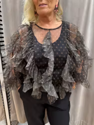 Prickig brun volangblus i mesh