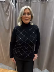 Svart polo med strass och pärlor