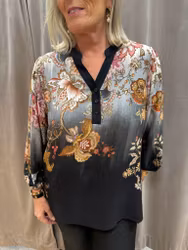 Blus med blommor