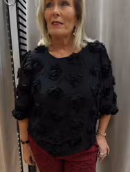 Svart blus med 3D-blommor
