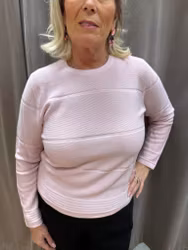 Ljusrosa stickad tröja