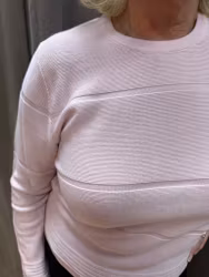 Ljusrosa stickad tröja