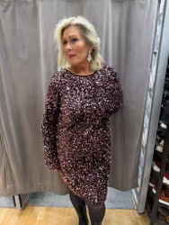 Rosa paljett klänning med rosett bak